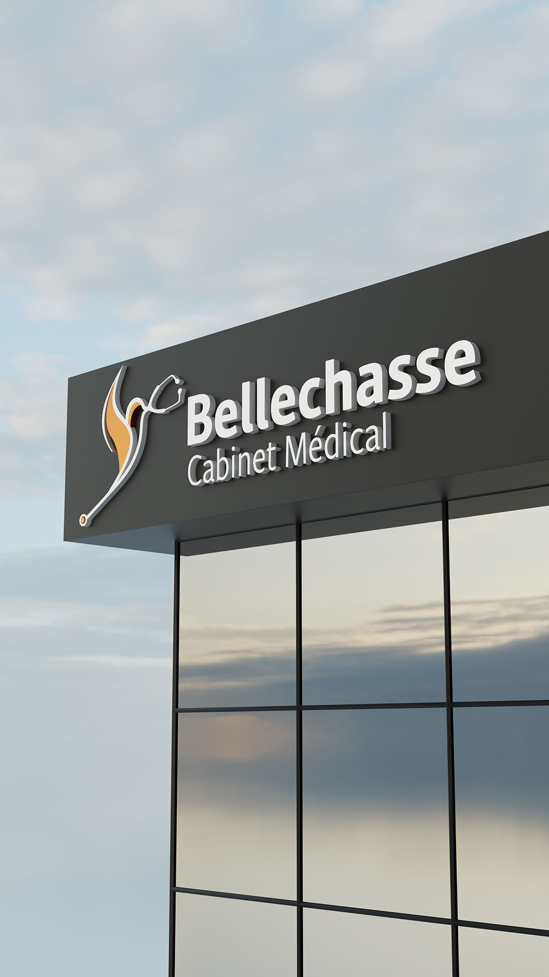 logo bellechasse sur la facade d'un immeuble.(Version mobile)